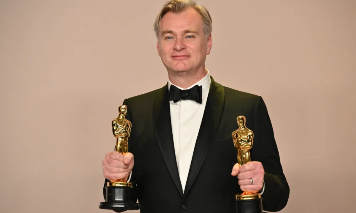 Nolan at the 2024 Oscars holding his two Academy Awards won for his movie "Oppenheimer". The trophies were for best director and best picture (Photo By: USA Today).